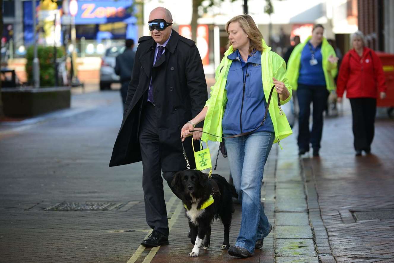 Charity Guide Dogs held a blindfold walk challenge in Ashford for the first time. Picture: Gary Browne