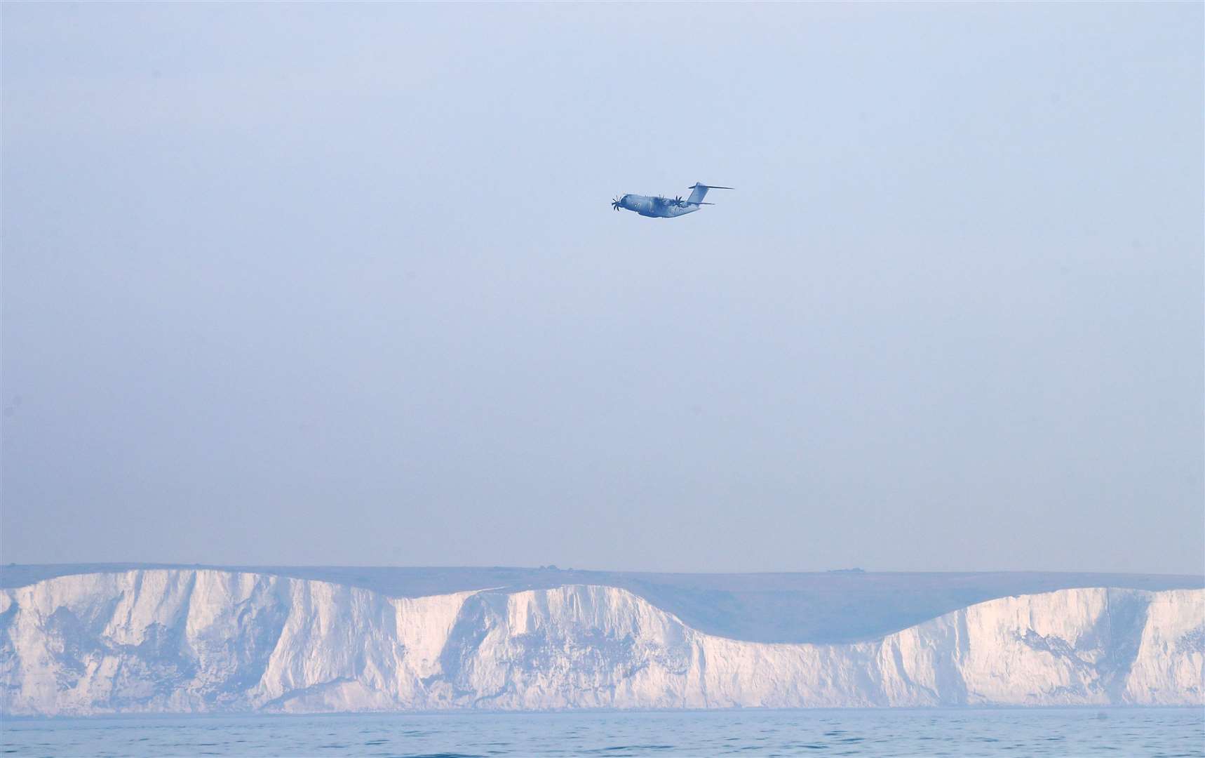 A Royal Air Force Atlas A400M aeroplane in the skies above Dover (Gareth Fuller/PA)