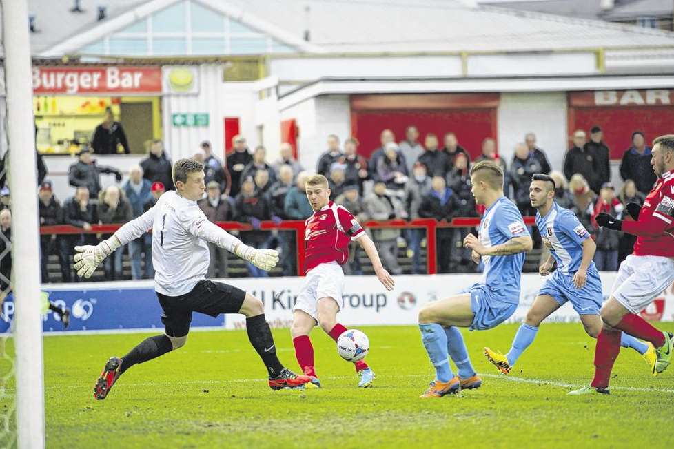 Alex Osborn (centre) gets the crucial touch for Ebbsfleet's equaliser