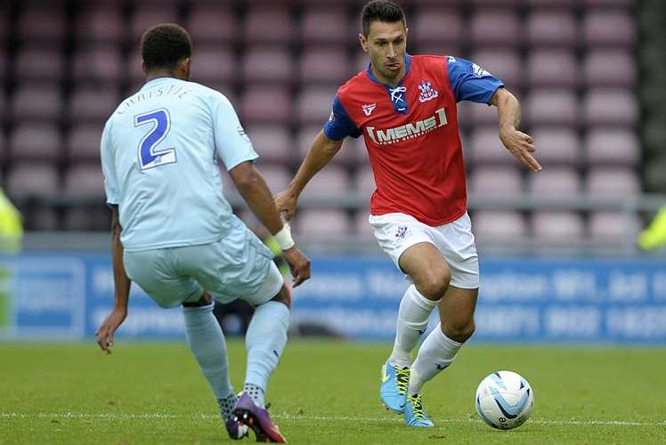 Joe Martin goes on the attack against Coventry at Sixfields Stadium. Picture: Barry Goodwin