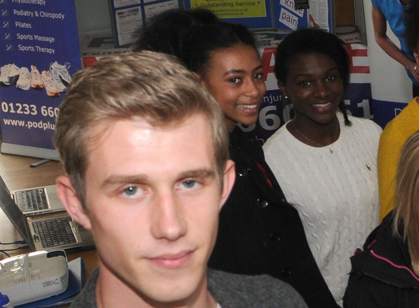 Shannon Hylton and Dina Asher-Smith posing with Jack Green in 2013.