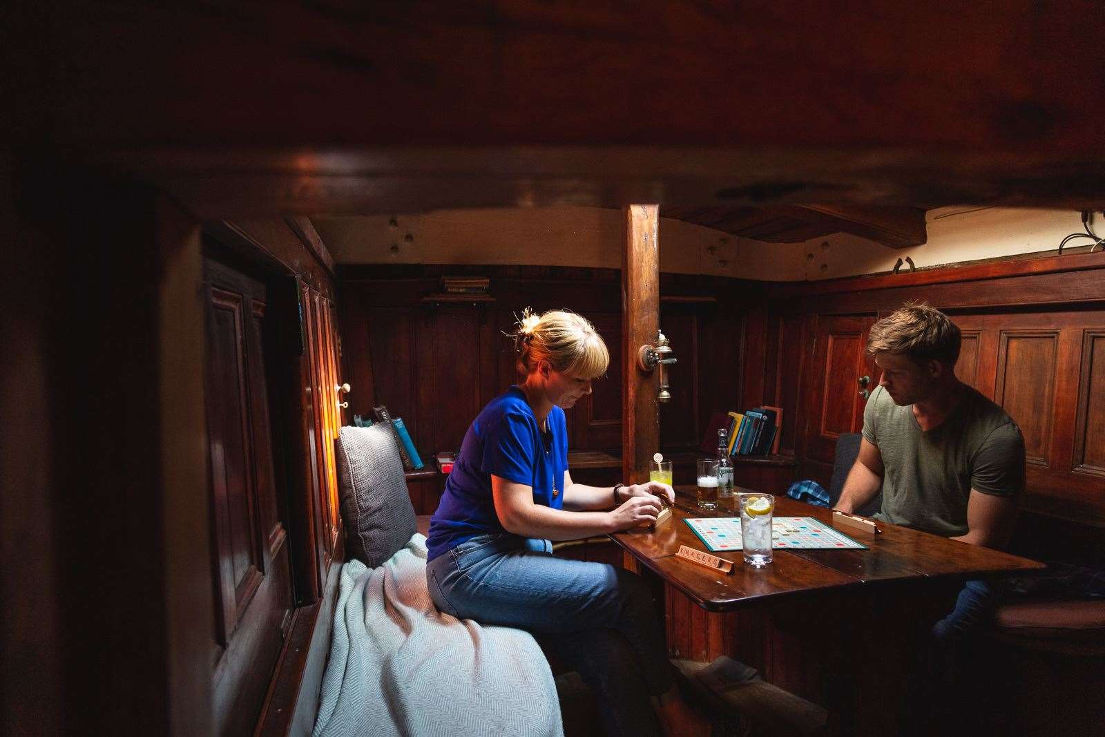 Ed Grandsen and Heather Burgess of Tiller and Wheel in the captain's quarters aboard the Edith May