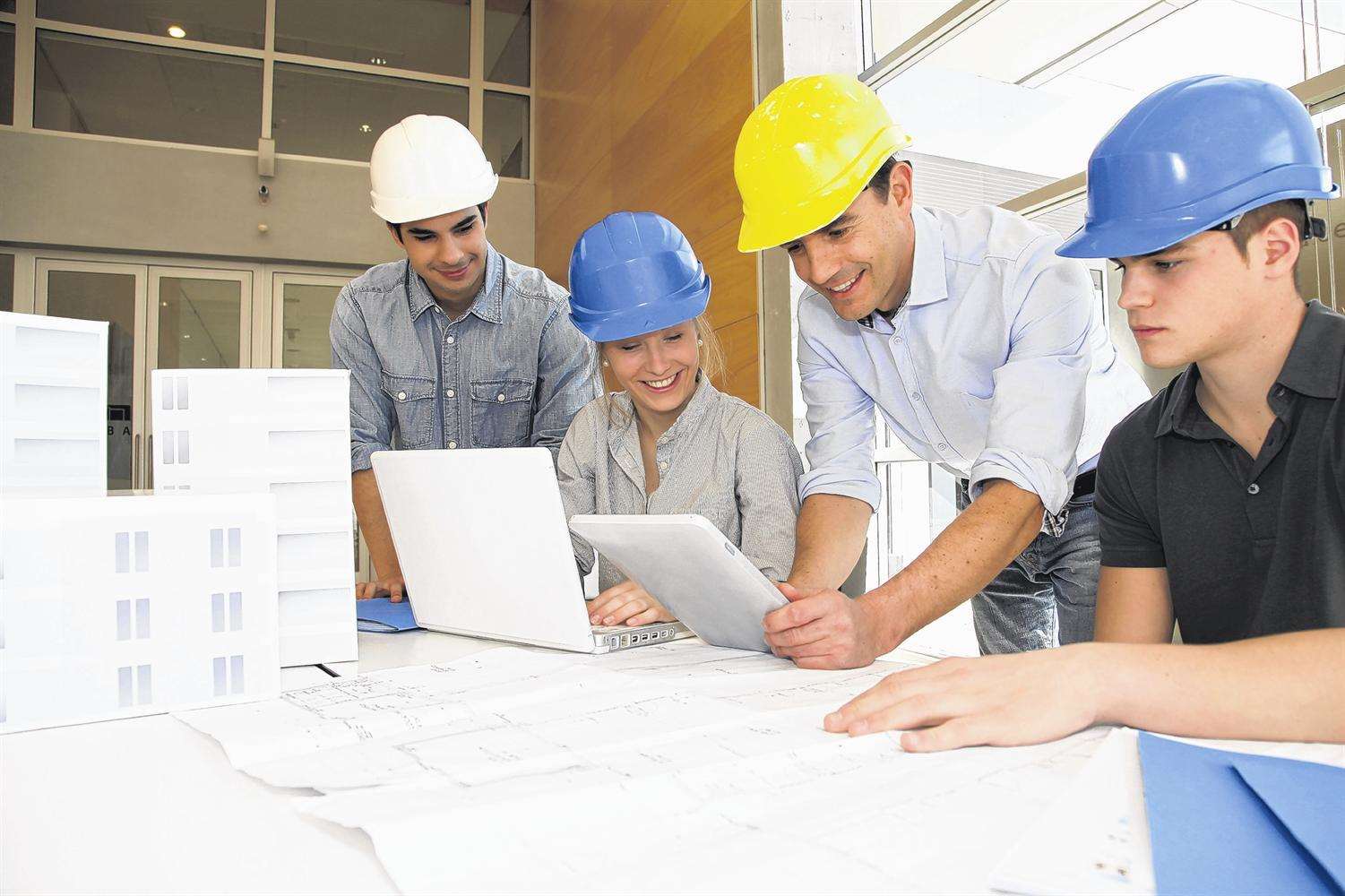 Construction boss with apprentices. Picture: iStock.com