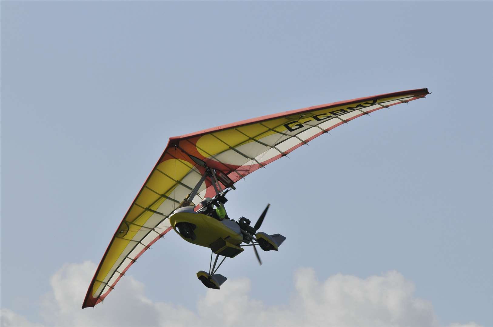 A member of the Kent Microlight Club flying over Sheppey