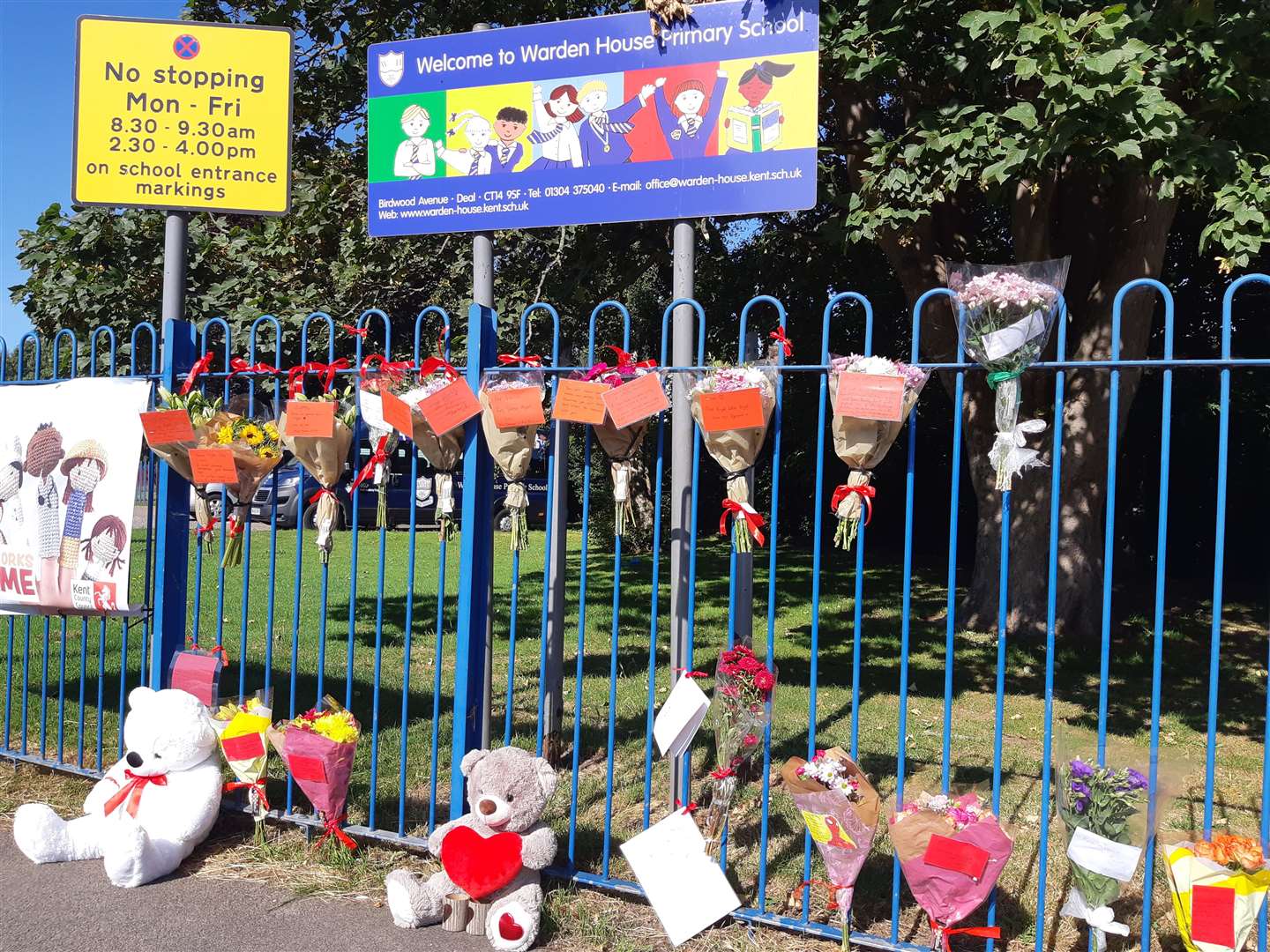 Teddies and flowers at the entrance to Lucas Dobson's primary school in Deal