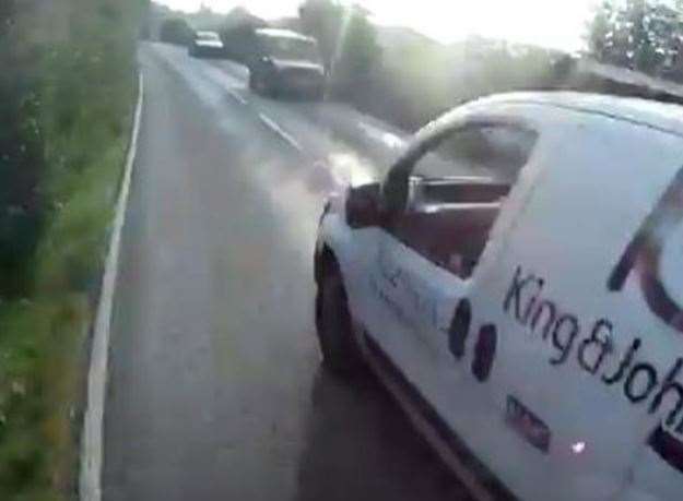 A van is captured on the cyclist's head cam