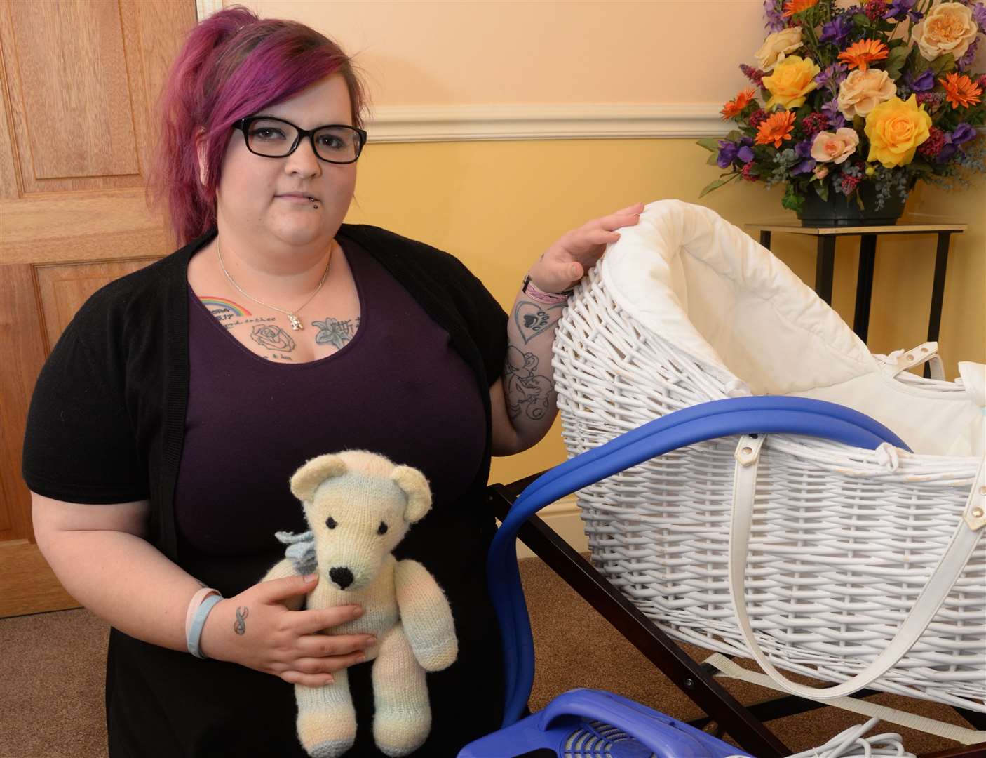 Stacie Goddard with the cuddle cot at Gore Brothers Funeral Directors in Margate on Tuesday. Picture: Chris Davey. (9411227)