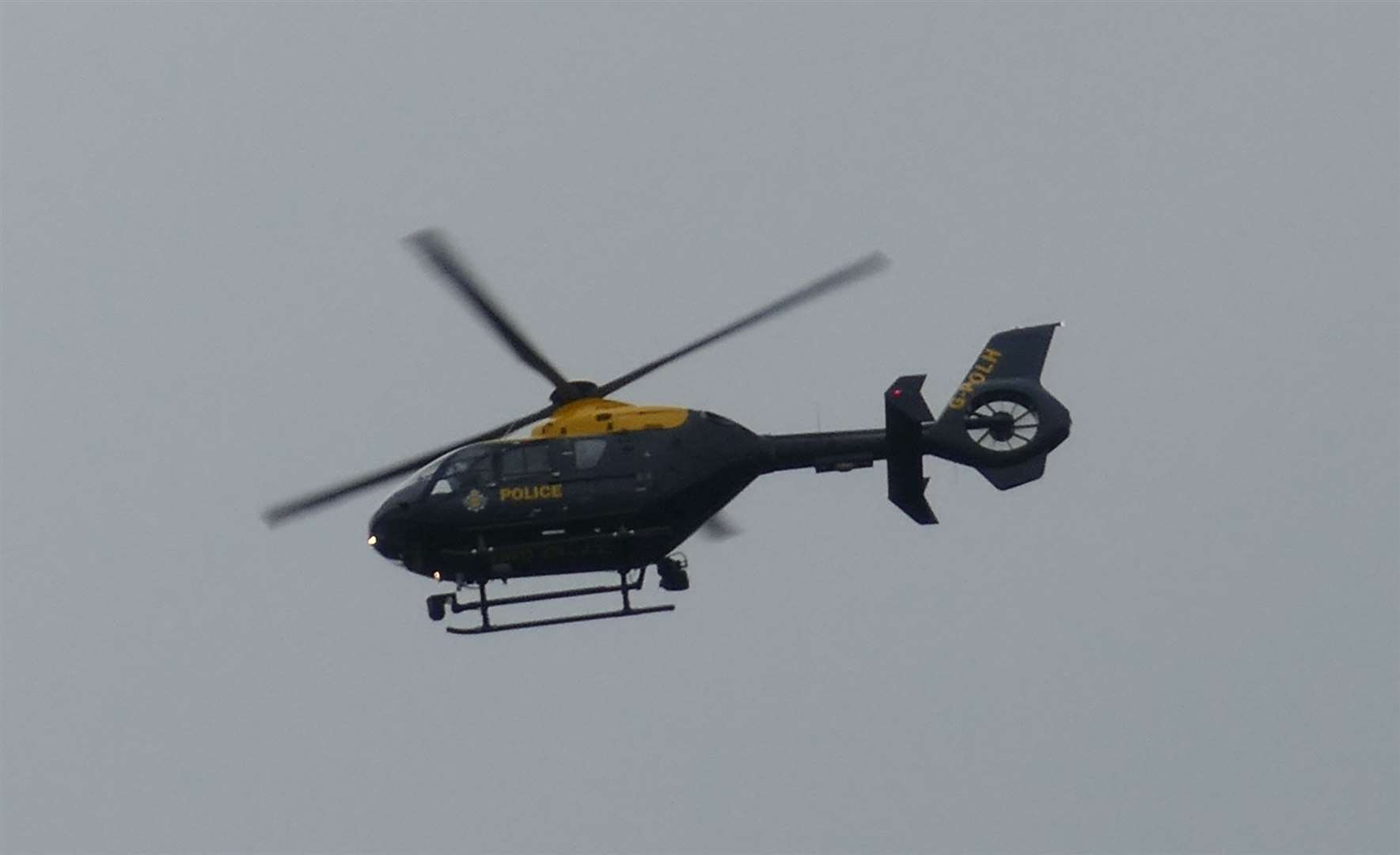 The police helicopter was seen circling over the area. Stock picture