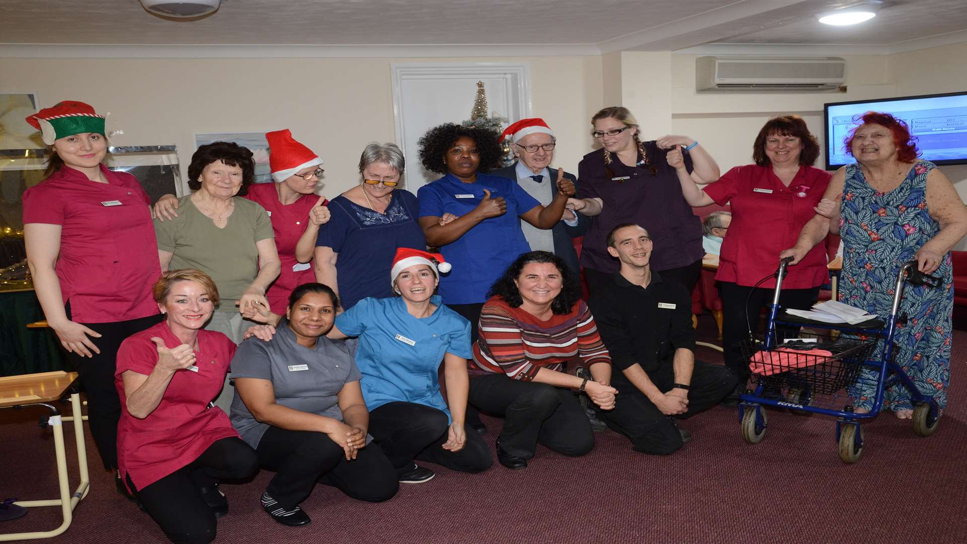 Staff and residents celebrating a top CQC report Lulworth House Residential Home Picture: Gary Browne FM5015170