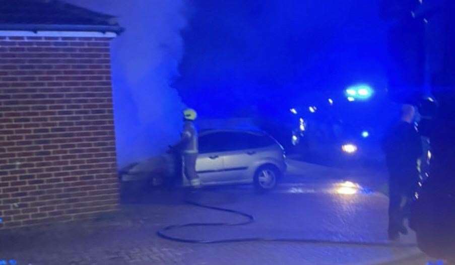 Firefighters tackle the blaze which destroyed the car in Maidstone last week