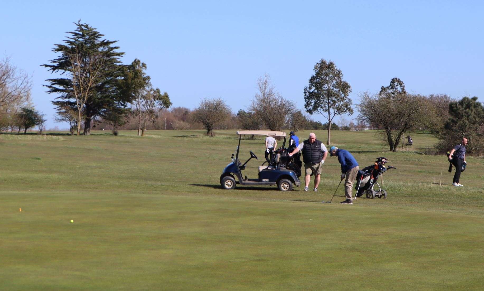 Golfers on the green at Sheerness Golf Club on Monday as the Covid-19 restrictions were eased