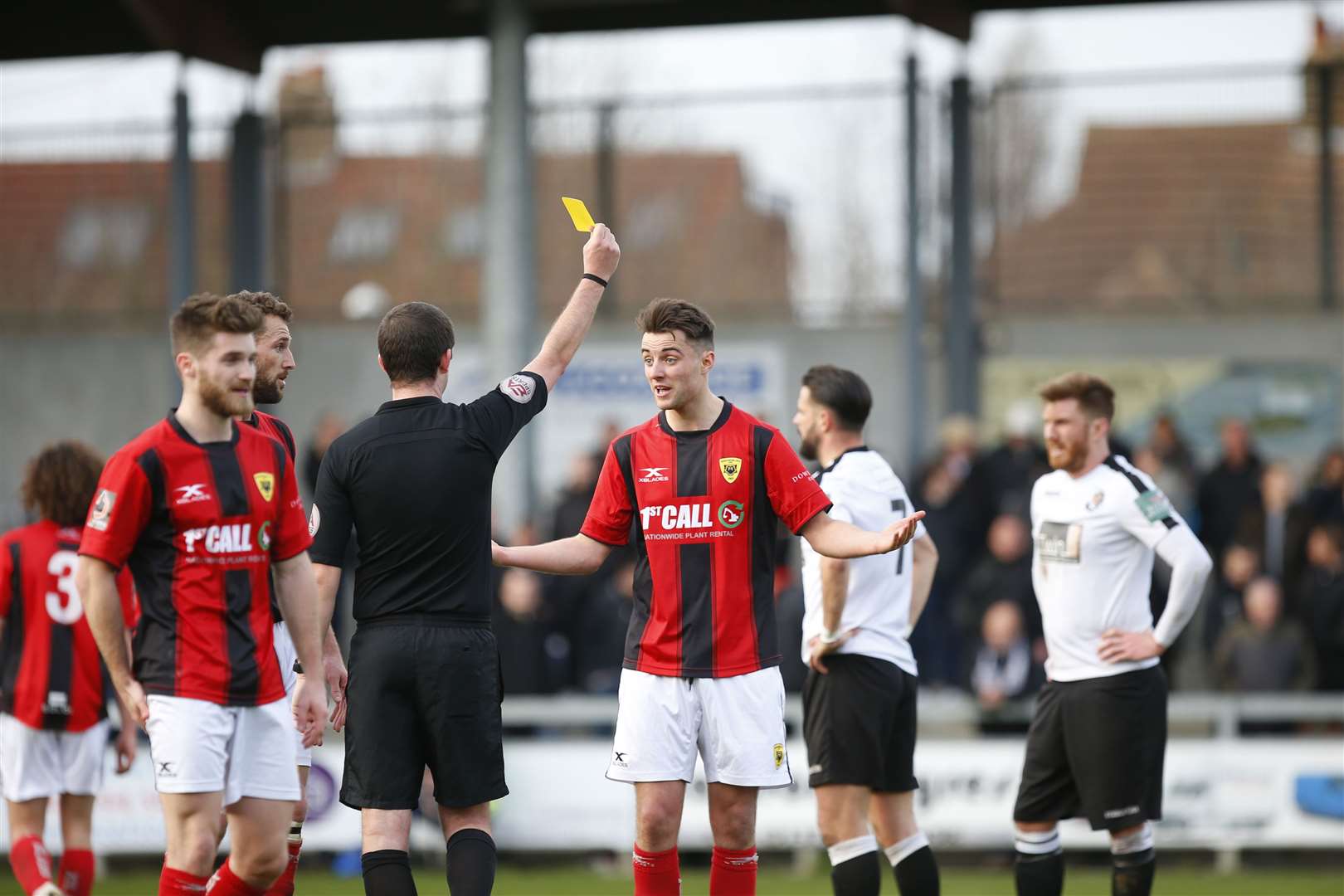 Referee Jack Packman goes to his pocket during Dartford's win over Gloucester Picture: Andy Jones