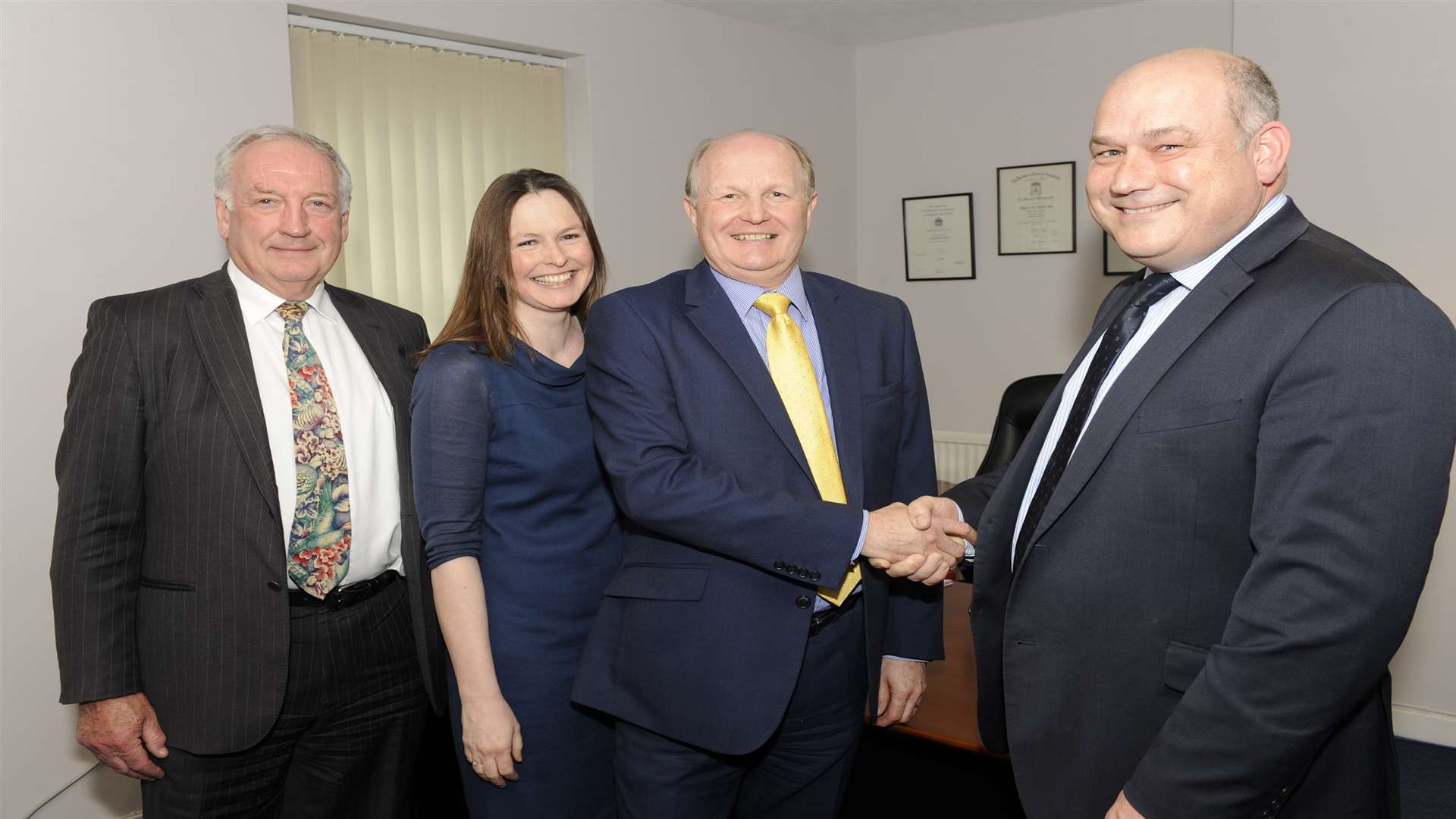 Tony Amlot, Claire Parry, Nigel Cripps and Rob Reynolds celebrate Lakin Clark's merger with Wilkins Kennedy