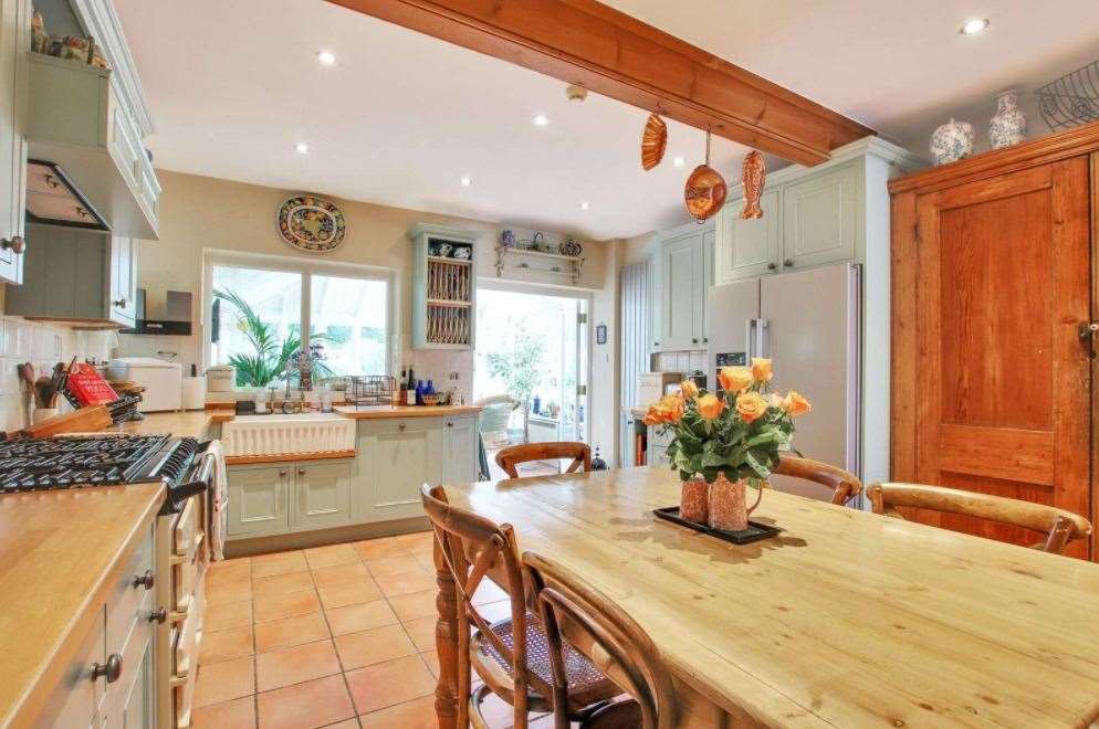 The kitchen includes several high-end appliances ready for new owners to use. Picture: Savills