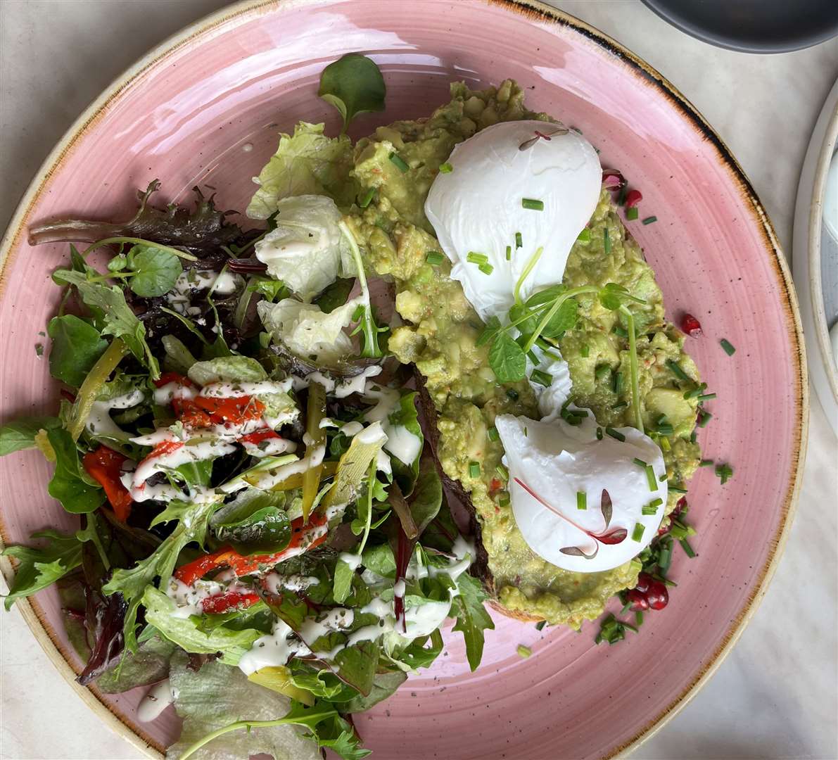 I opted for the ‘Avocholic’ which was smashed avocado on toast with poached eggs and a side salad
