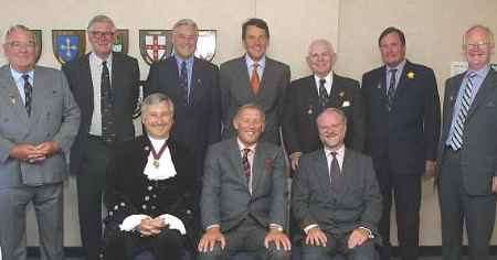 Sir David Phillips, centre in front row, with other VIPs