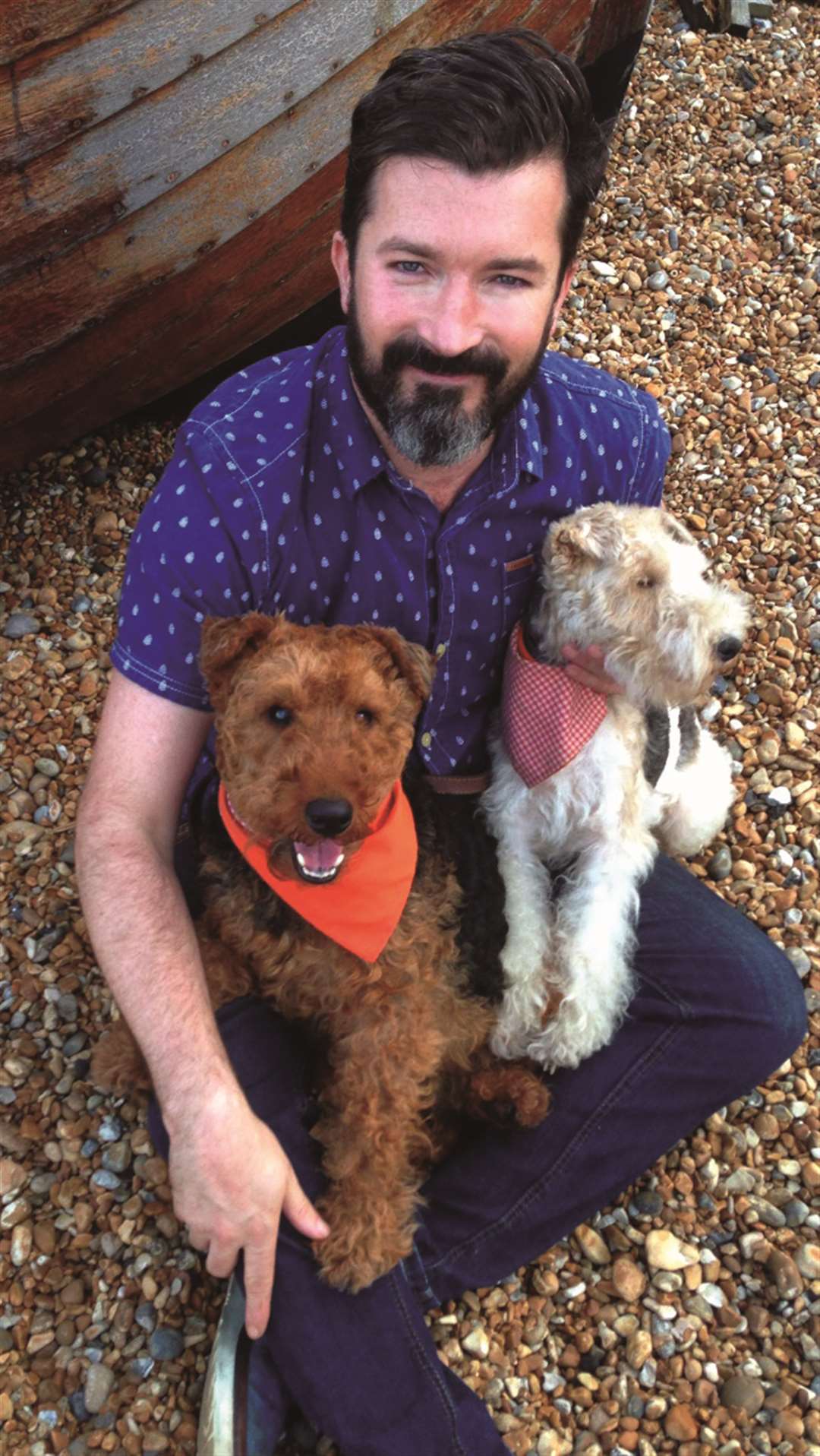 Organiser of the meeting Steven Colburn with his dogs Pheobe and Ianto in their orange bandannas.