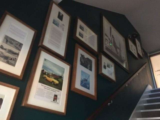 There is plenty of framed Spitfire memorabilia lining the stairs up to the Lancaster Bar