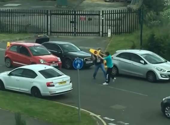 Road rage incident at The Bridge estate, Dartford. Fight between two men, using traffic cones.