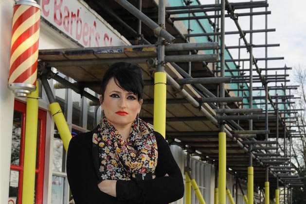 Bella's Boutique owner Blerina Shehaj's shop is hidden by scaffold and is affecting her business