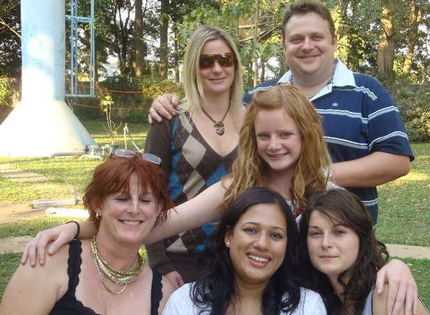 Jessica (back left) and her family in Zambia