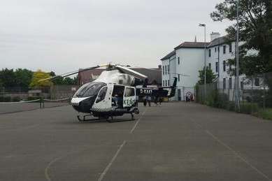 The air ambulance lands at a school in Gravesend after the incident. Picture: Nick Bultitude
