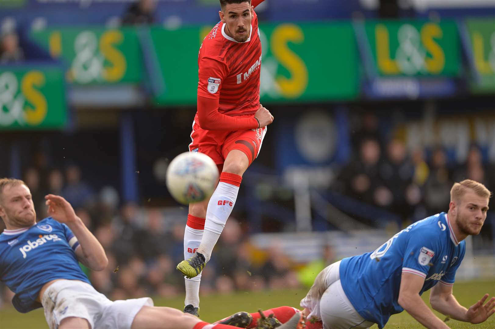 Gillingham's Conor Wilkinson scores the equaliser against Portsmouth Picture: Ady Kerry