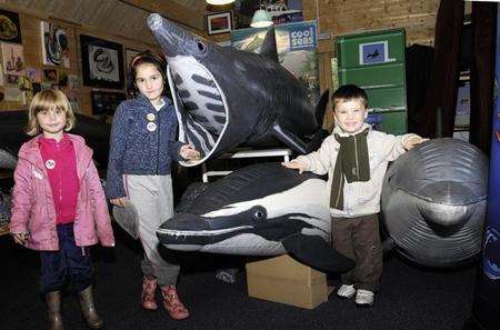 Left to right: Josie Davies, Elena Strugger and Connor Page with some of the inflatable sea creatures on show at the Whitstable Harbour Day
