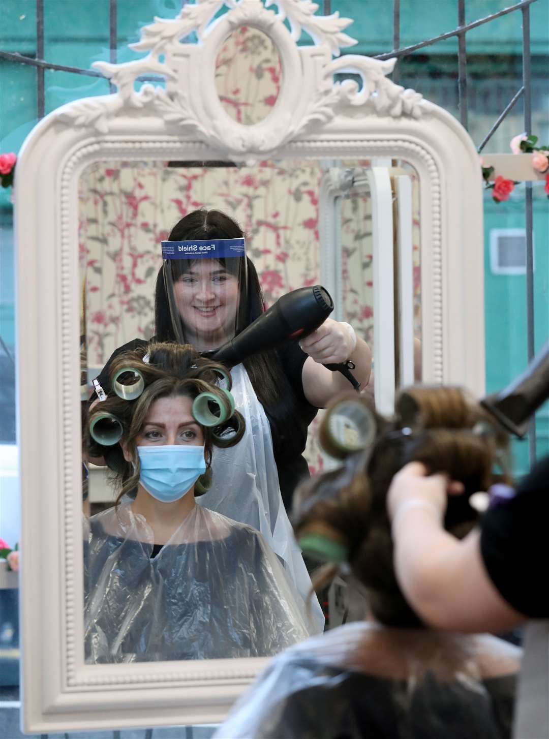 Meanwhile in Scotland, hairdressers are preparing to reopen to customers on Wednesday (Andrew Milligan/PA)