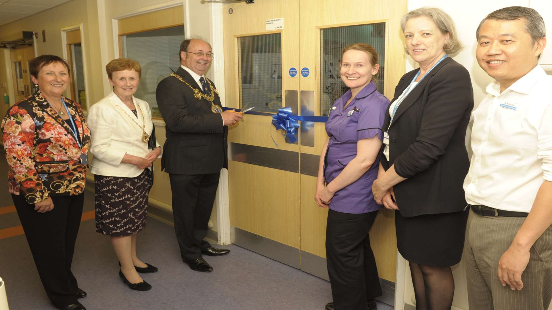 Opening the new unit, from left to right, the new chief executive Lesley Dwyer, Joyce and Barry Kemp, Louise Proffitt, Shena Winning and Dr Aung Soe.