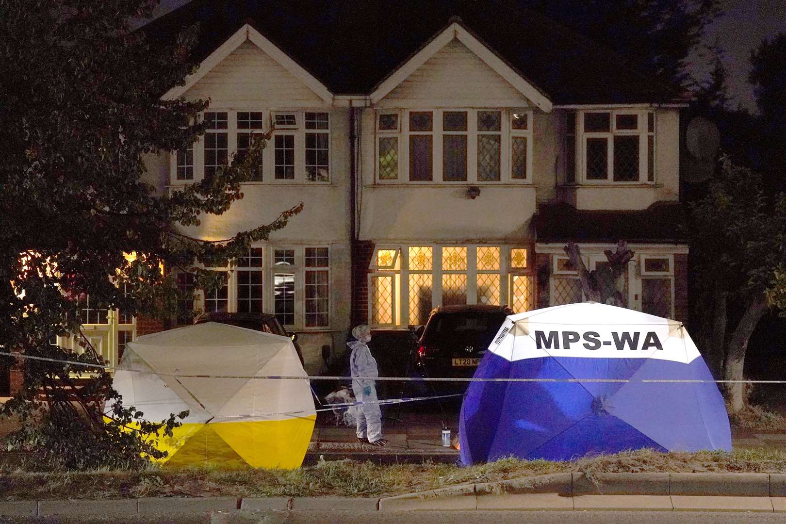 Police at the scene of the murder in Greenford, west London (Kirsty O’Connor/PA)