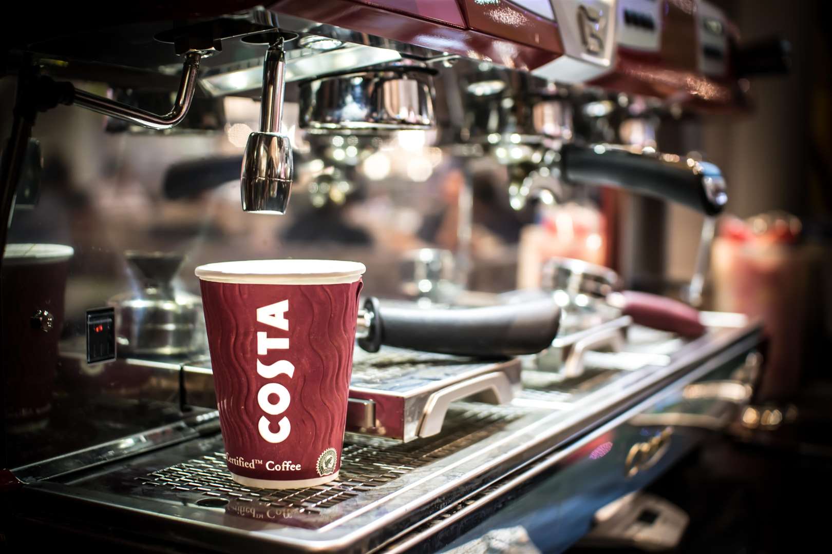 A Costa coffee being prepared