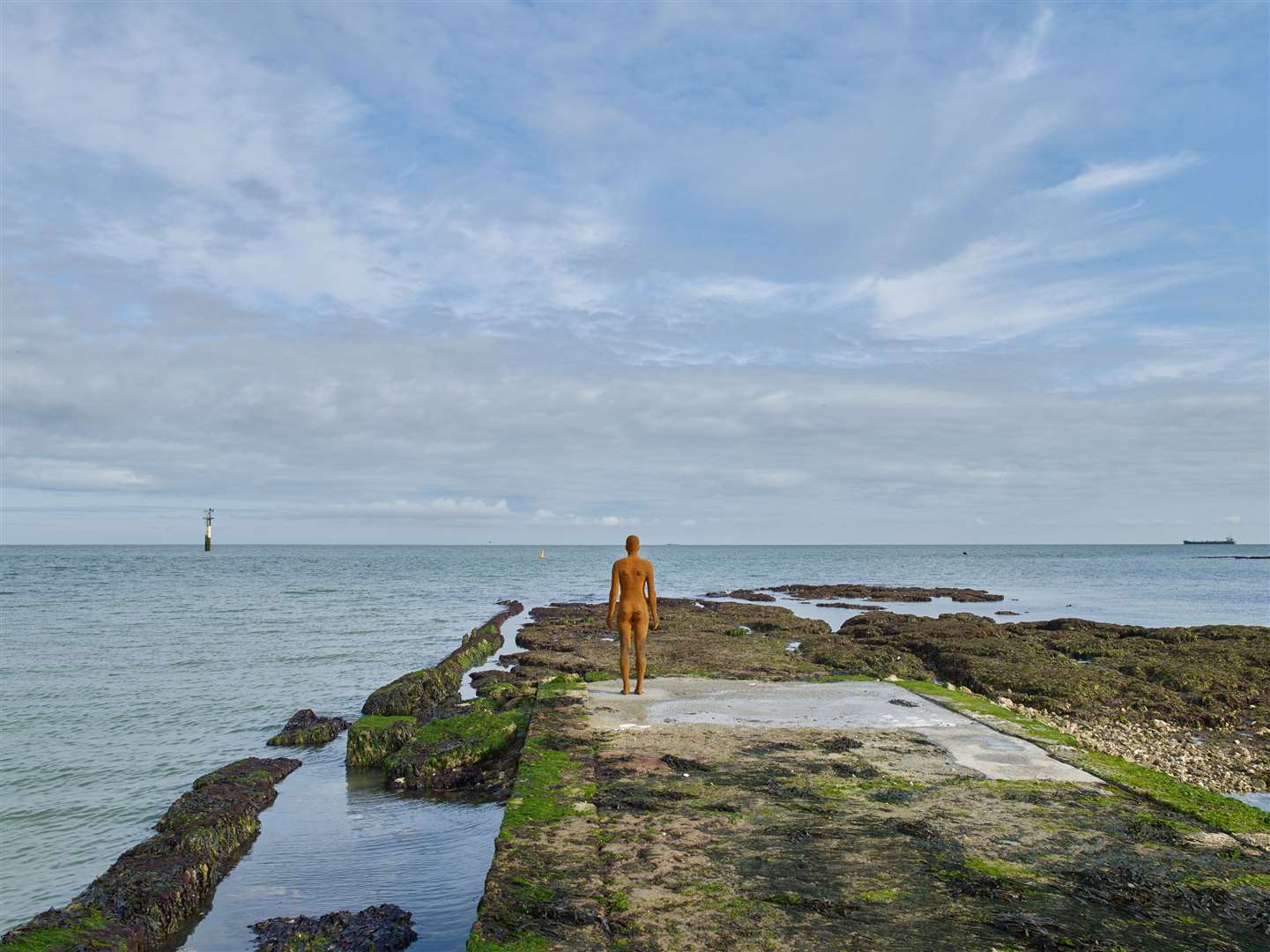Antony Gormley's sculpture faces out to sea