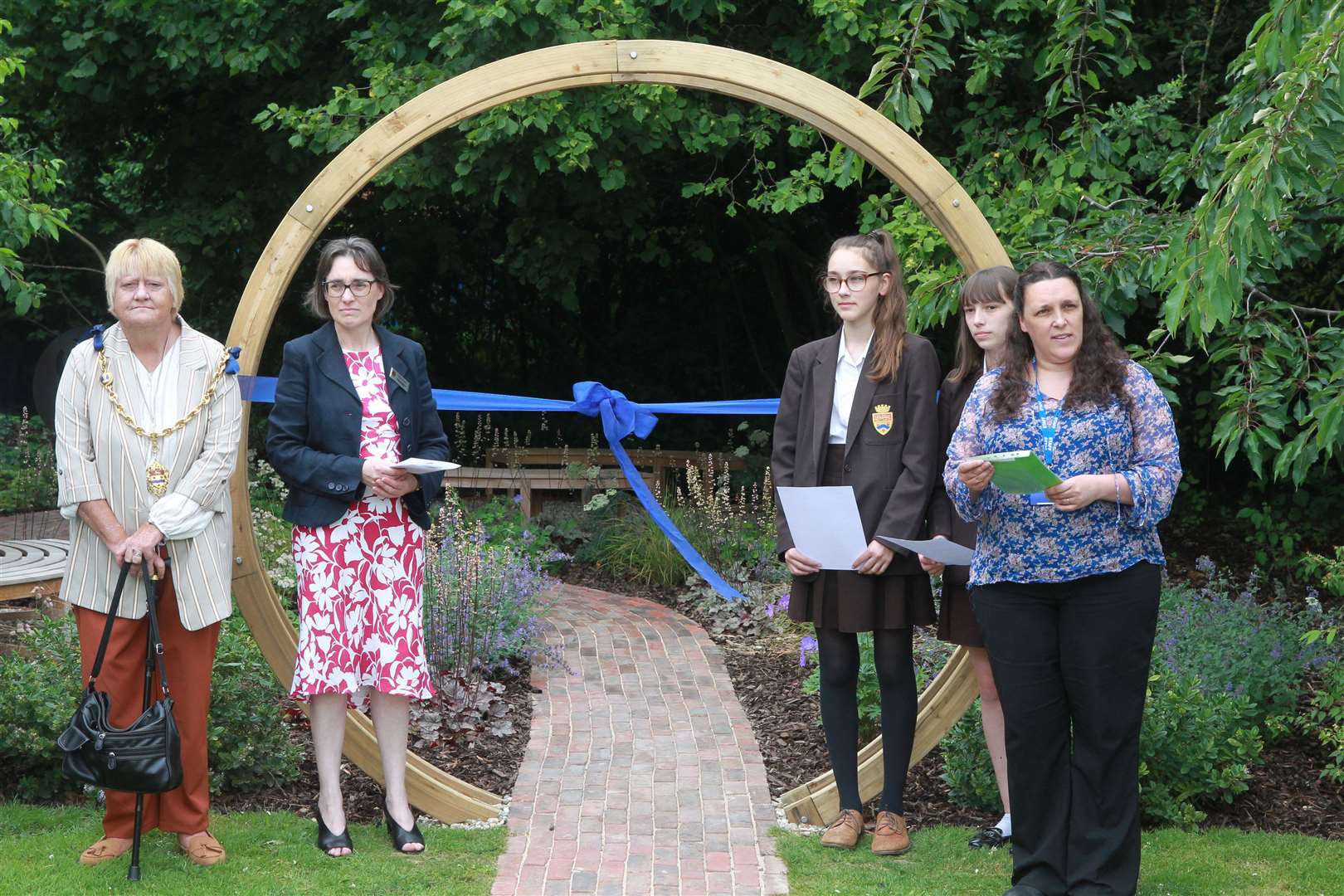 From left, the mayor of Maidstone Cllr Marion Ring, Deborah Stanley, headteacher, Bethya and Charlotte, both 14 and Kerry Green, school counsellor at the grand opening of The Woodland Garden. Picture: John Westhrop (13607545)