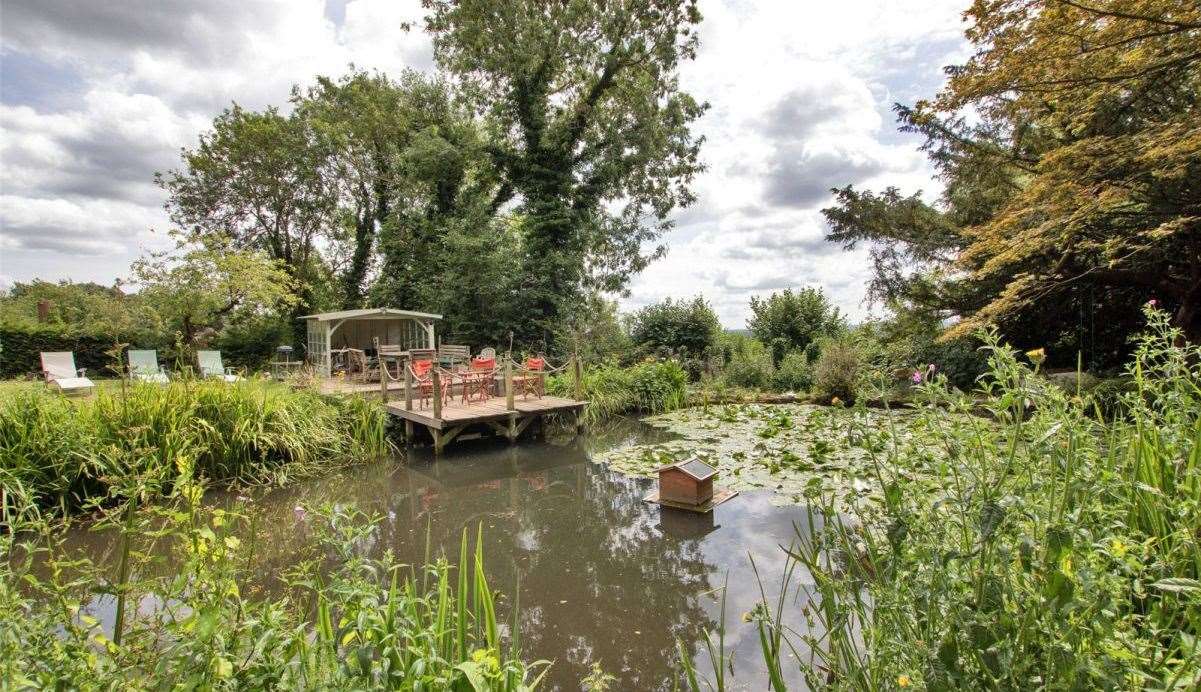 There are two ponds, one with a jetty and decking and the other being an ornamental pond. Picture: Strutt and Parker