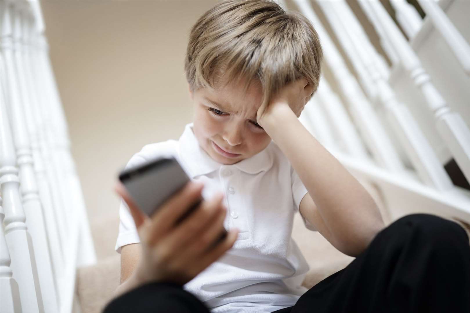 It has been argued that cyber bullying by mobile phone is just one of the ways they are being misused in schools. Stock image