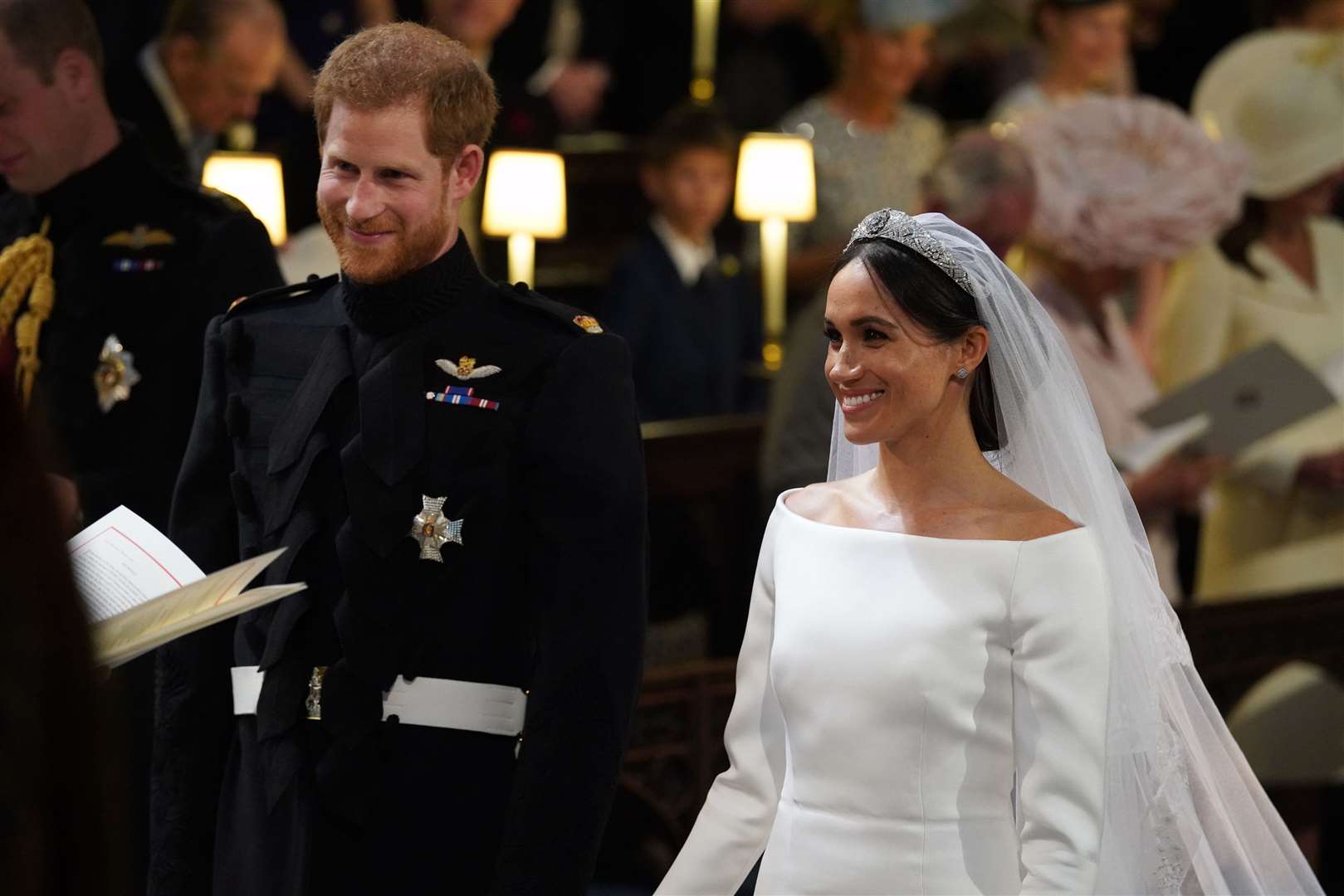 Prince Harry and Meghan Markle in St George's Chapel at Windsor Castle during their wedding service. Photo credit: Jonathan Brady/PA Wire.