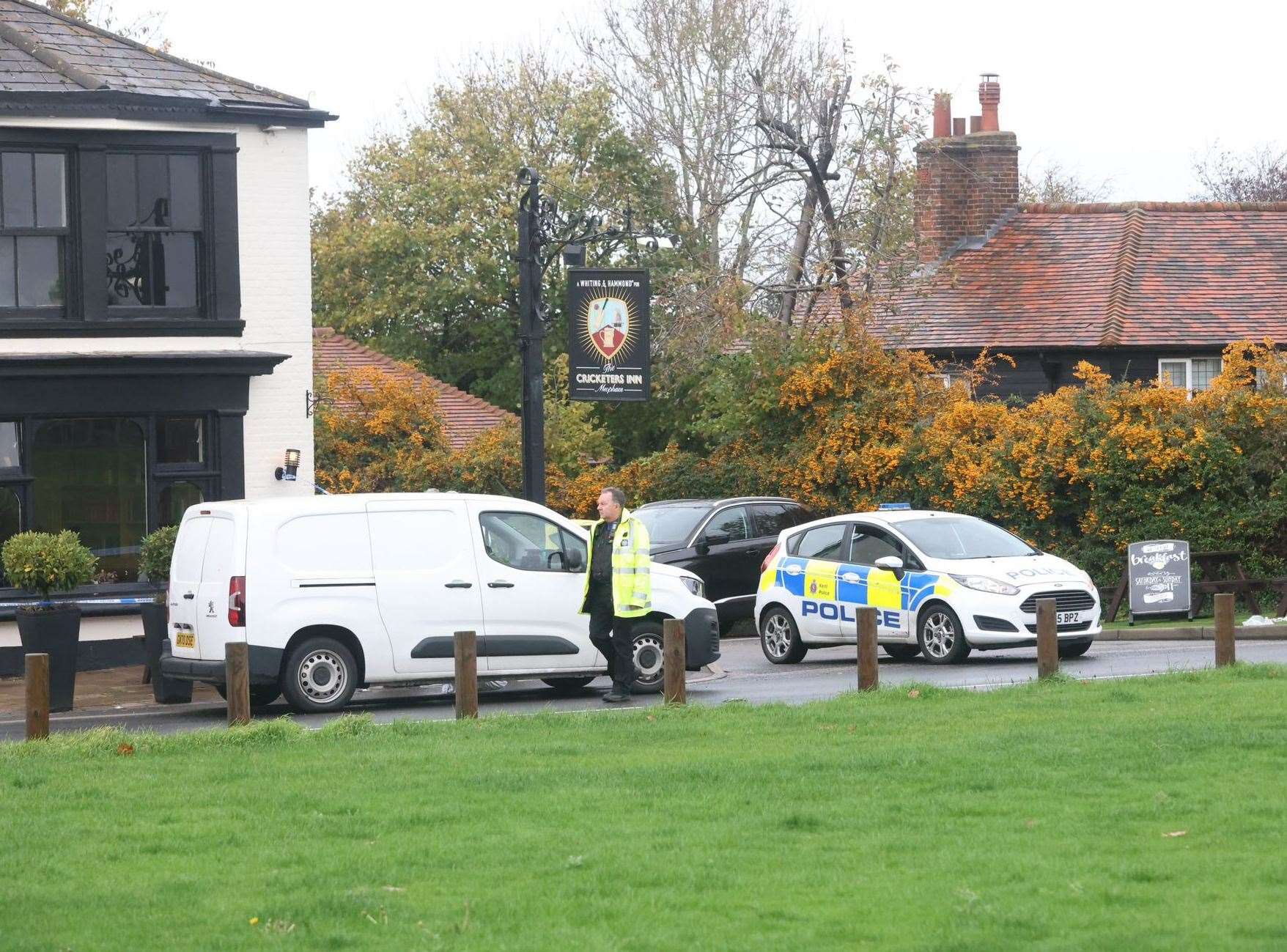 Police at the Cricketers Inn pub in Meopham where Craig Allen was killed. Picture: UKNIP