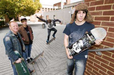 Chairman, Jordan Rogers, right. Left = Father and son, Dave and Daniel (16) Green. Skateborder = Nathaniel Spacey (17).