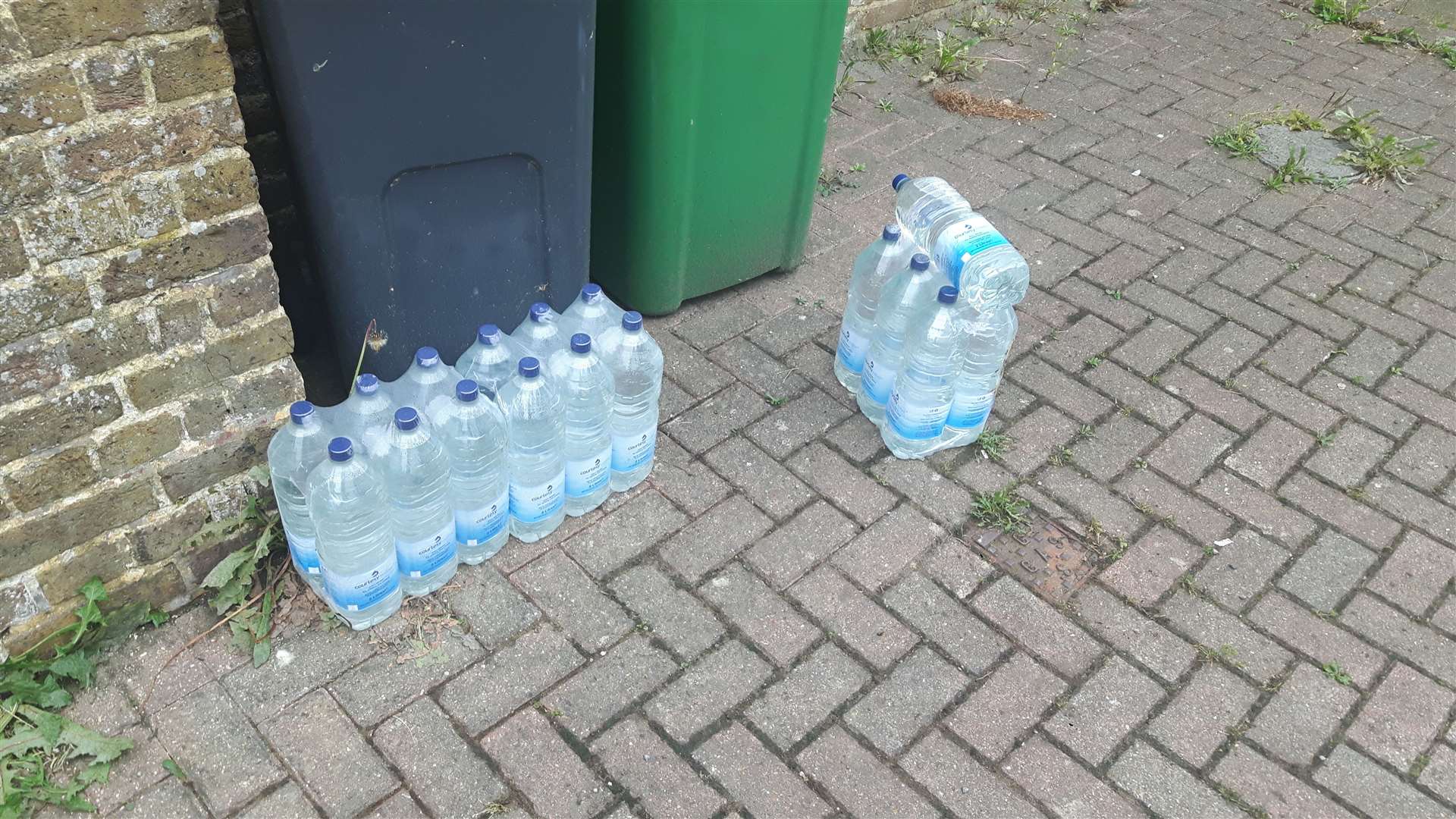 Bottled water left by South East Water for residents use