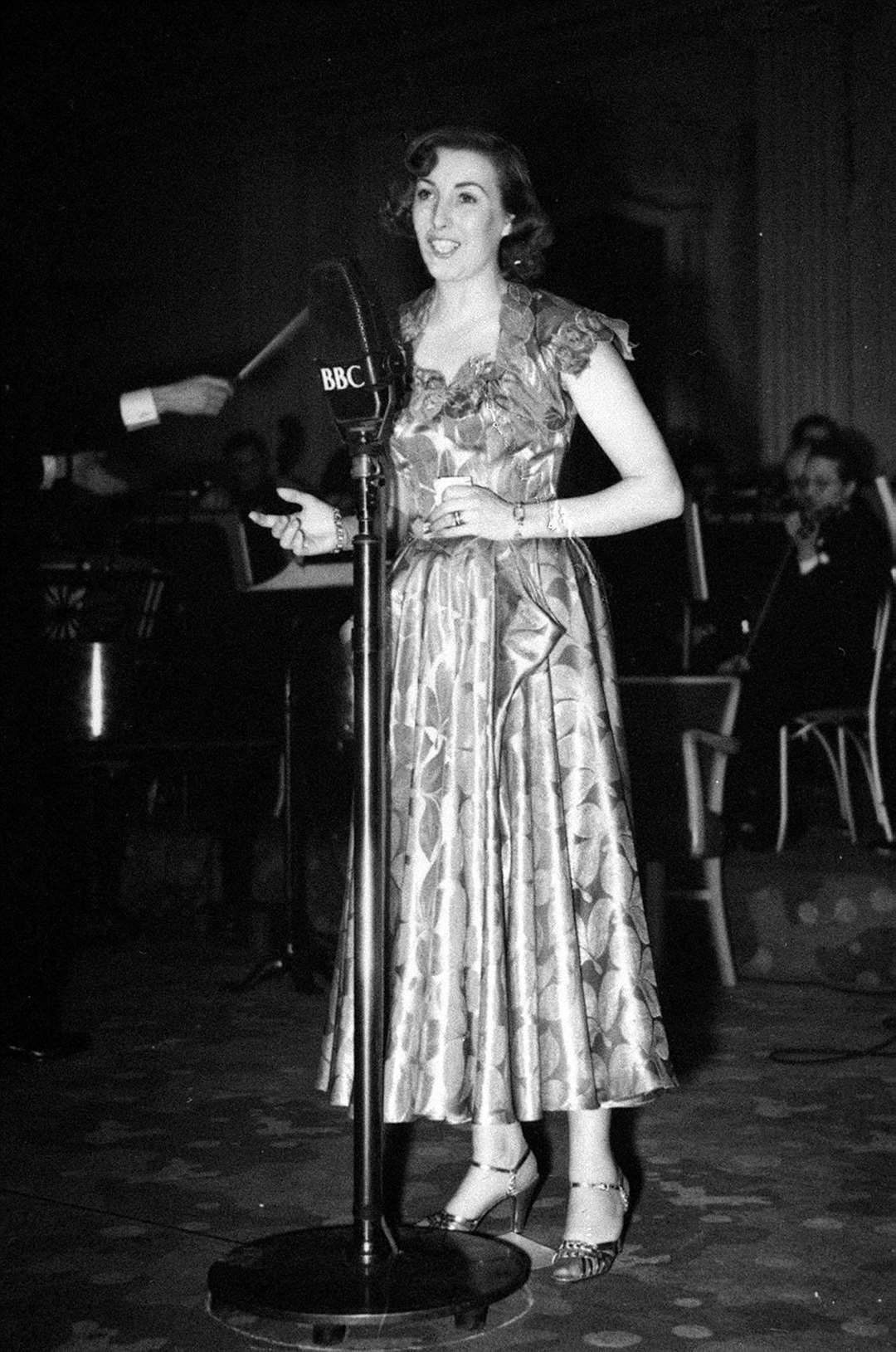On stage at Grosvenor House in 1950 (PA)