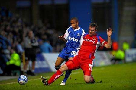 Simeon Jackson tussles with Carlisle captain Danny Livesey in their goalless draw at the Priestfield. Picture: Barry Goodwin
