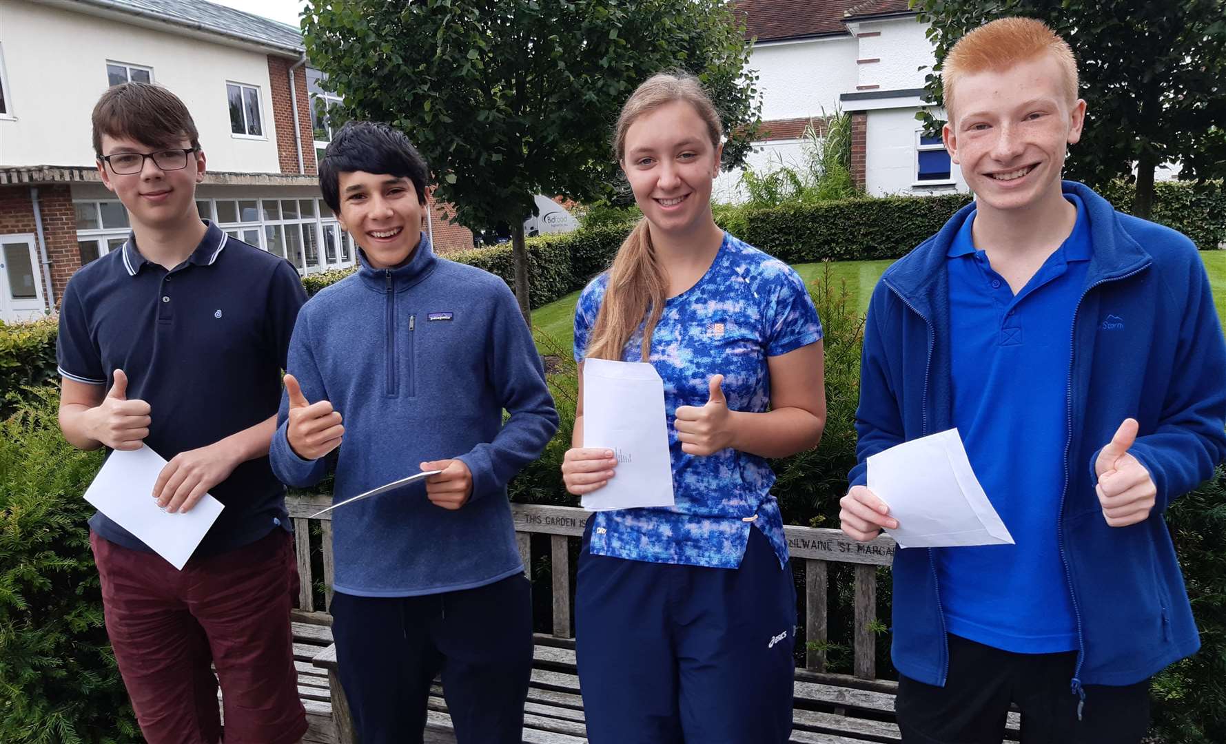 Toby Loy, David Wild, Scarlett Washington and James Gardiner are all happy with their results at Sutton Valence School