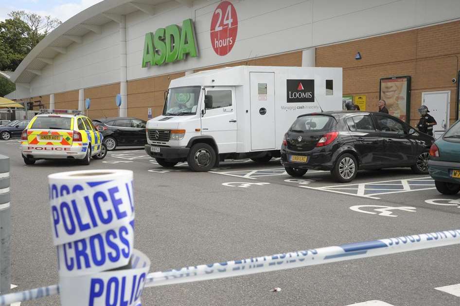 A police cordon was thrown around the cash van. Picture: Andy Payton