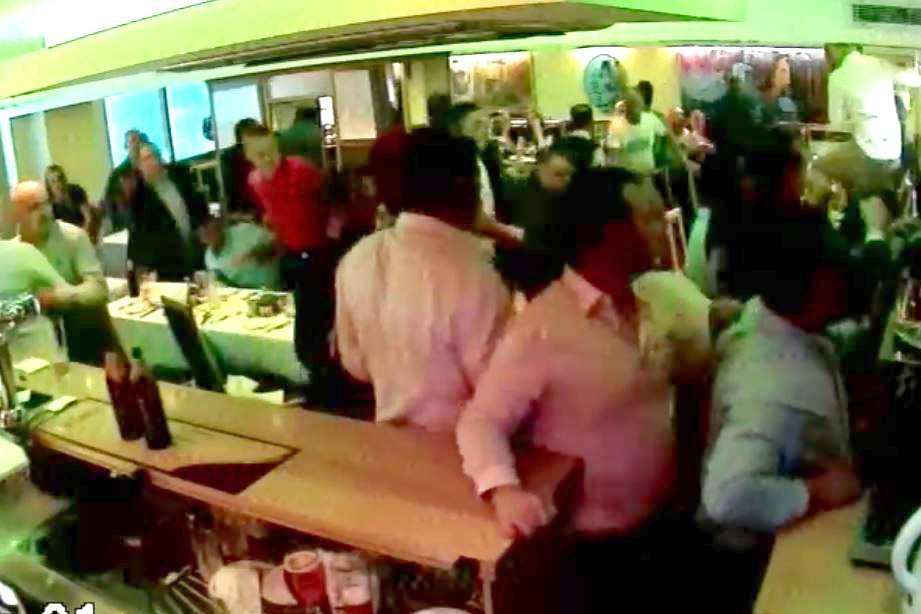 CCTV images show the moment a group of men started a brawl in the Shozna Indian restaurant