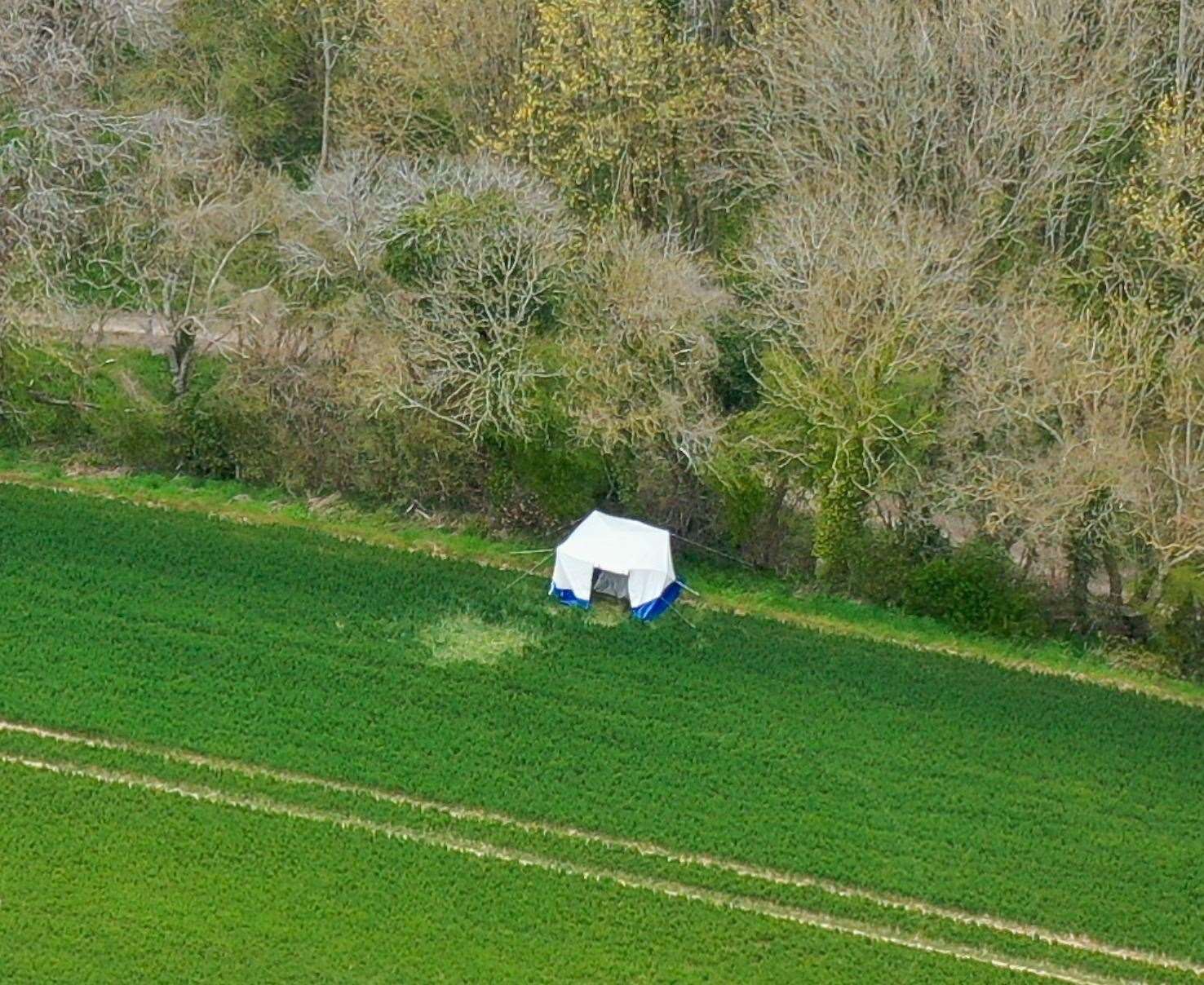 A police tent in a field in Snowdown where officers are investigating the death of PCSO Julia James. Picture: UKNIP