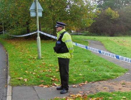 A police officer guards the scene of the alleged assault. Picture: Sarah Marshall