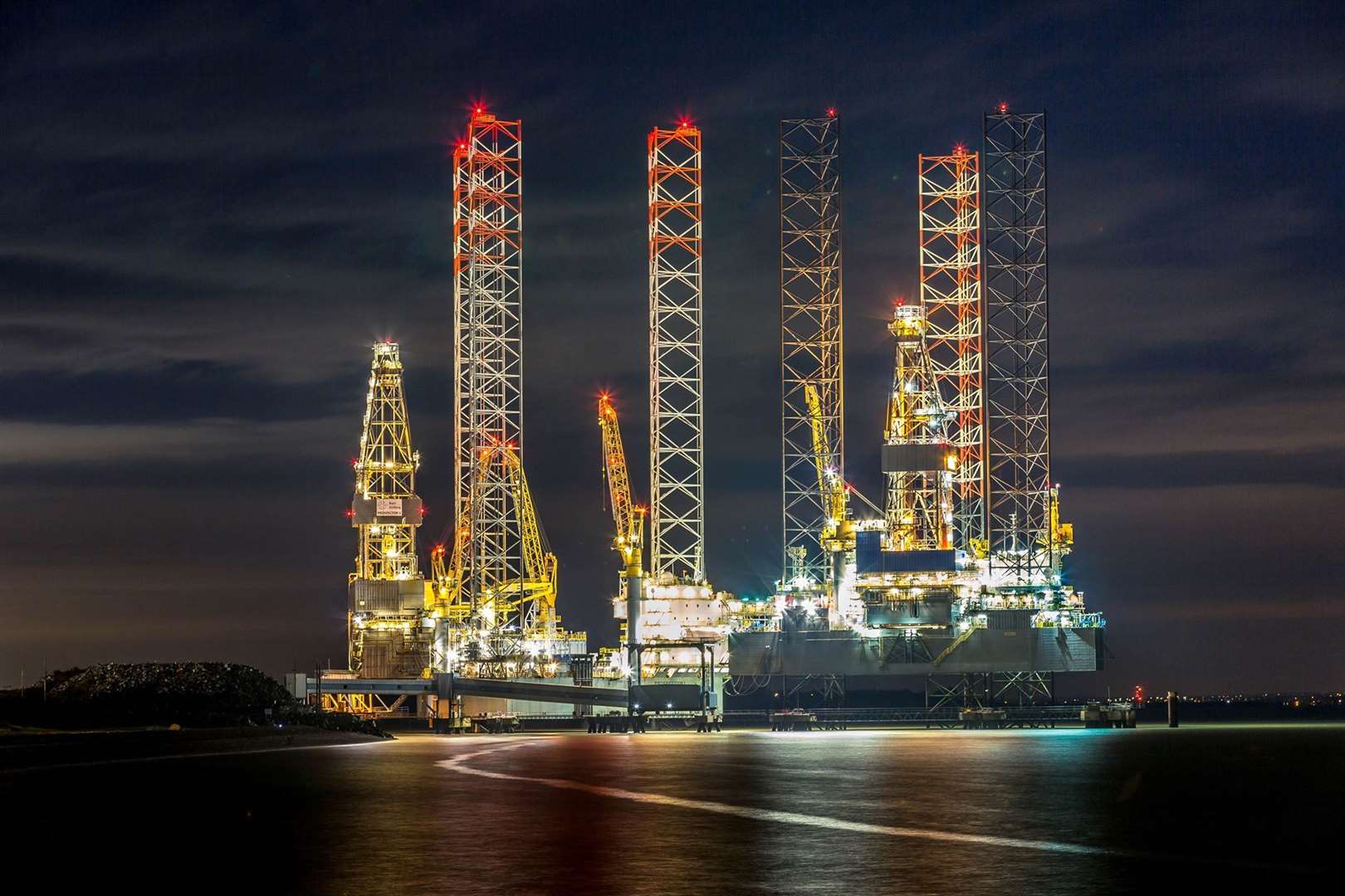The two oil rigs at night while they were moored at Sheerness. Picture: Glen Smith