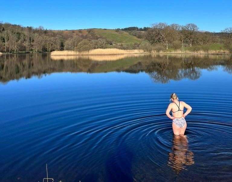 Rachel Ingram, from Ashford, going wild swimming. Picture: SWNS