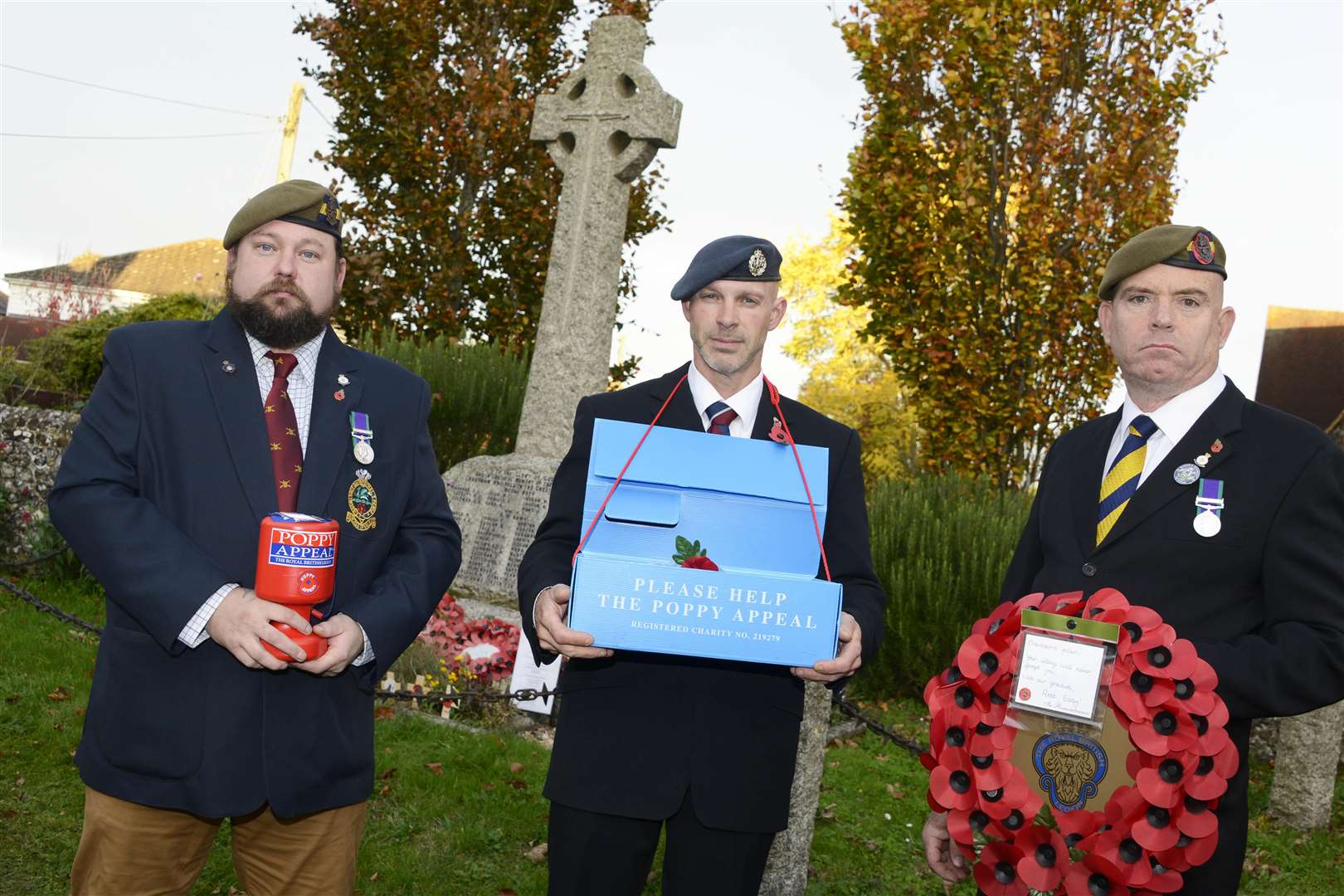 Chartham poppy sellers, from left, Steve Pryce, Charlie Thomson and Stuart Mears have had doors closed on them while collecting. Picture: Paul Amos